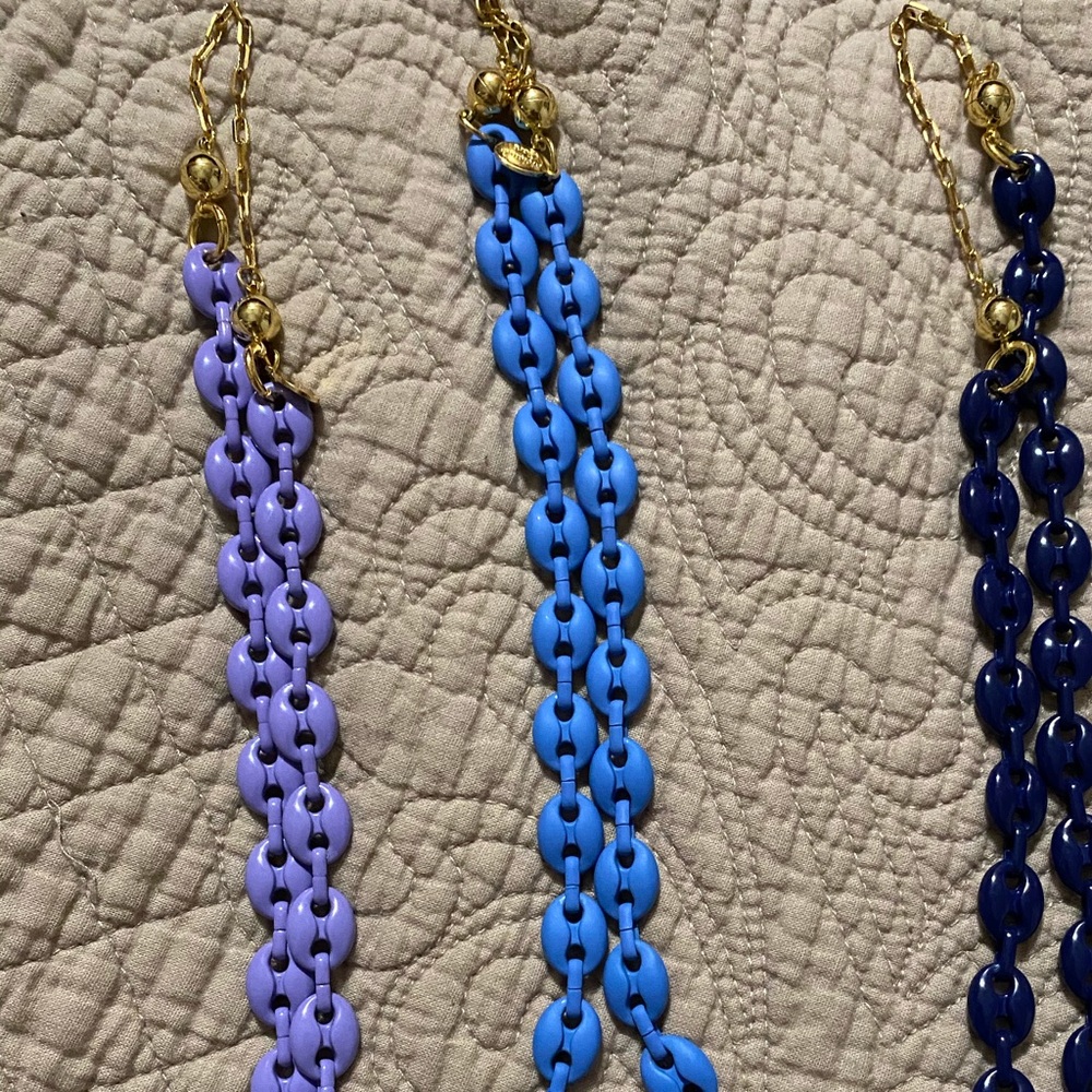 Melania Clara lavender alaia necklace (far left)